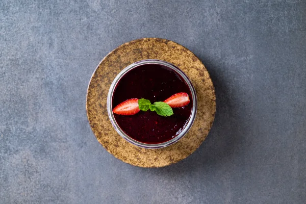 Silky Panna Cotta with red fruit coulis and authentic Italian flavours, served at The Meet Up in Cascavelle, Mauritius.