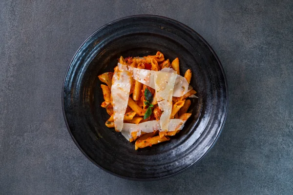 Spicy Arrabbiata Penne with rich tomato sauce, garlic, chilli and authentic Italian flavours, served at The Meet Up in Cascavelle, Mauritius.