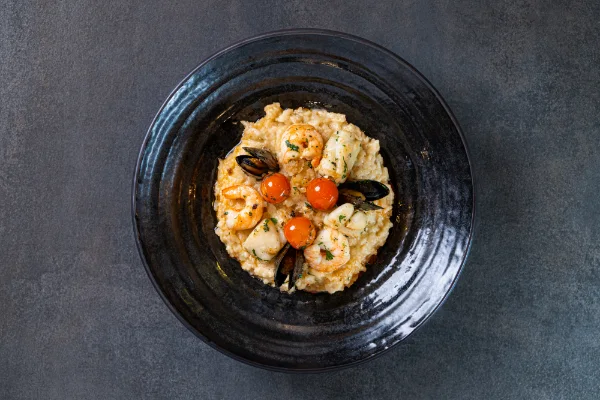 Creamy Seafood Risotto with fresh seafood, Arborio rice and authentic Italian flavours, served at The Meet Up in Cascavelle, Mauritius.