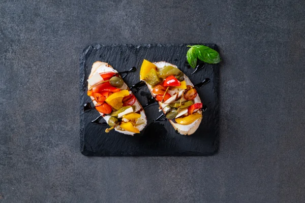 Crispy Bruschetta with creamy ricotta, fresh tomatoes and authentic Italian flavours, served at The Meet Up in Cascavelle, Mauritius.