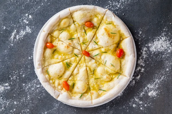 Freshly baked Focaccia with authentic Italian herbs, olive oil and a golden crust, served at The Meet Up in Cascavelle, Mauritius.