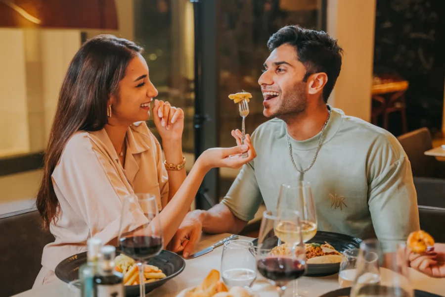Couple enjoying a meal together at The Meet Up restaurant in Cascavelle, Mauritius.